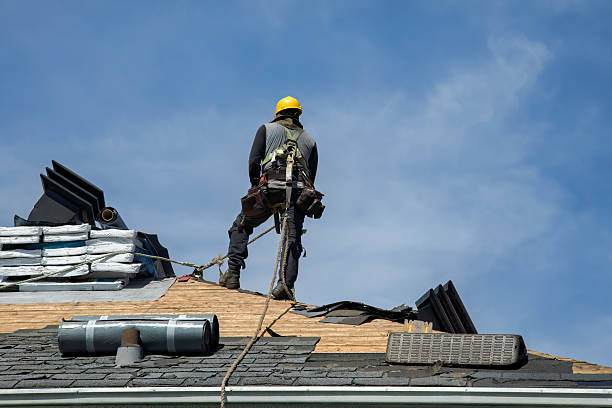 Professional Roofing technician working in Florence, MT